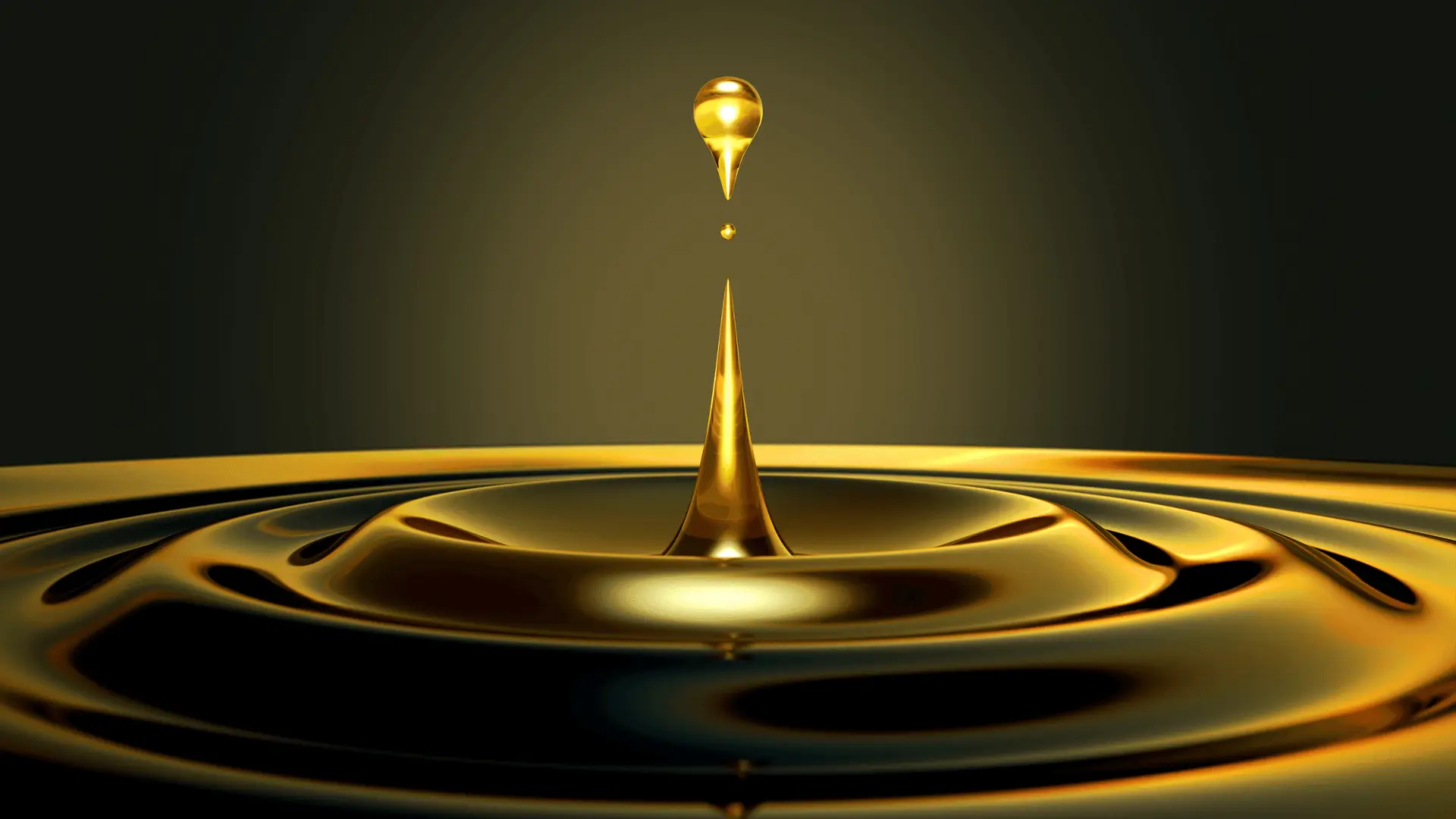 Golden lubricant oil droplet creating a ripple